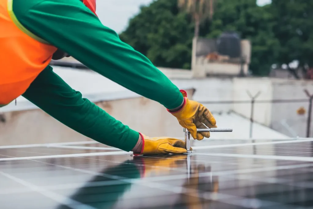 roofing and solar installation team working on a Houston home